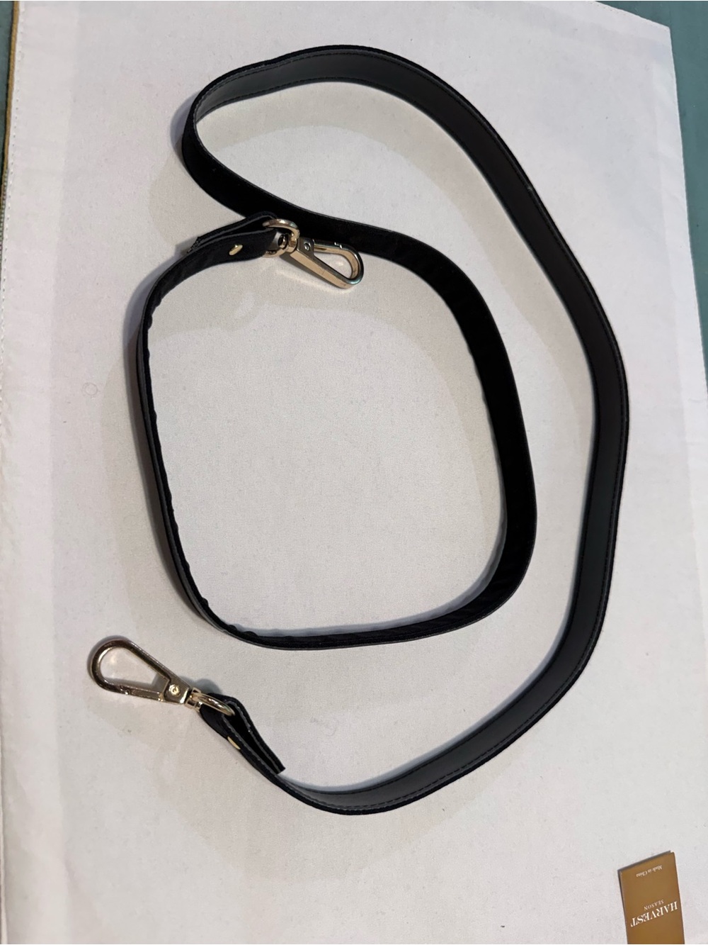 Black nylon/faux leather crossbody strap with gold Hardware